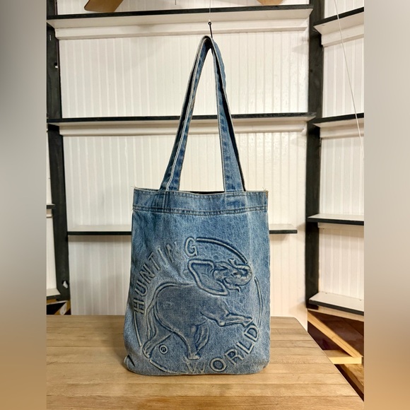 Hunting World Handbags - $357.99- Hunting World Blue Denim Elephant Embroidered Tote- Fill-A-Bag